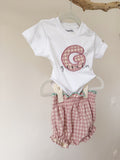 Conjunto camiseta y cubrepañal personalizado