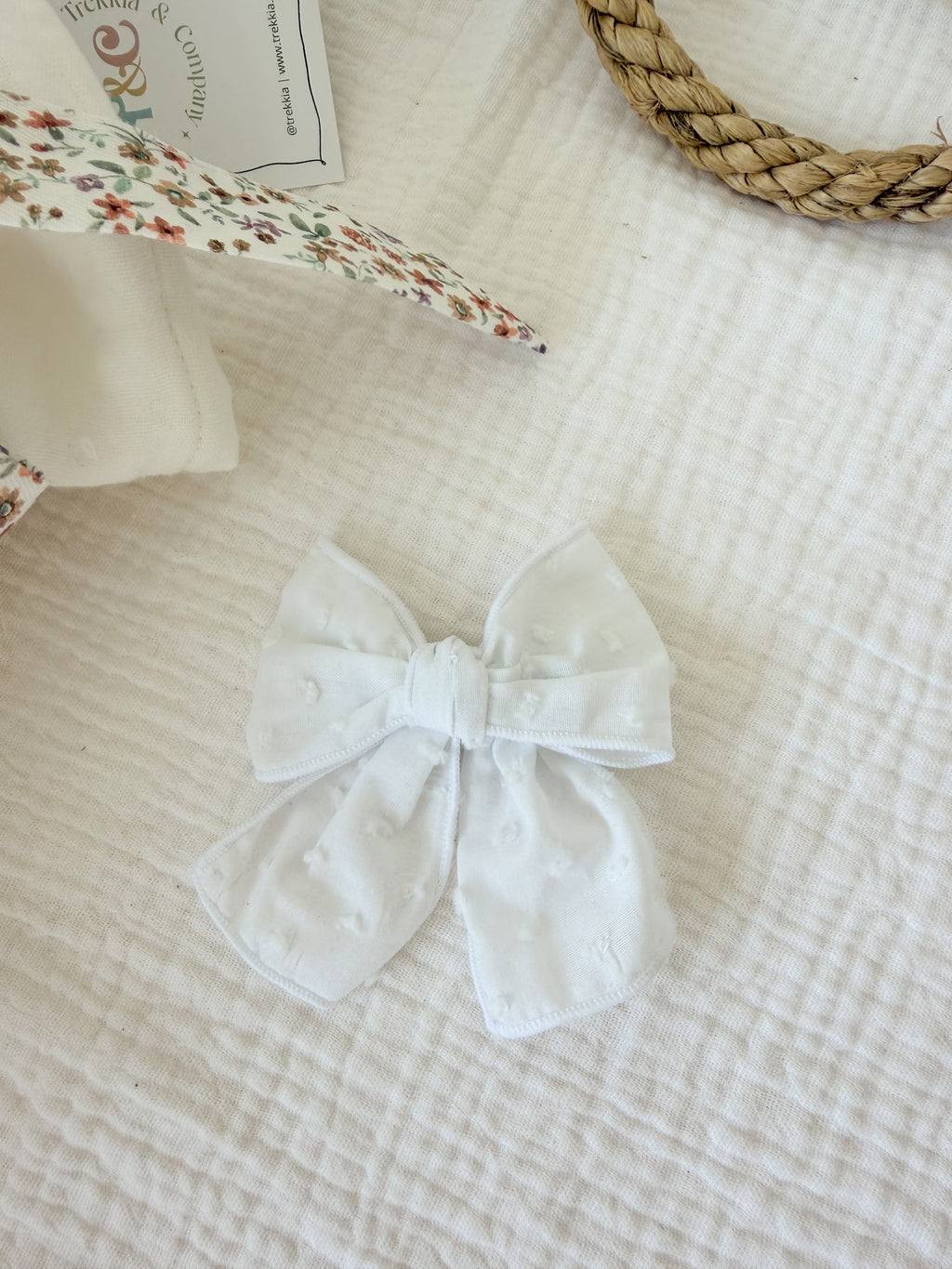 Lazo pelo, plumeti blanco