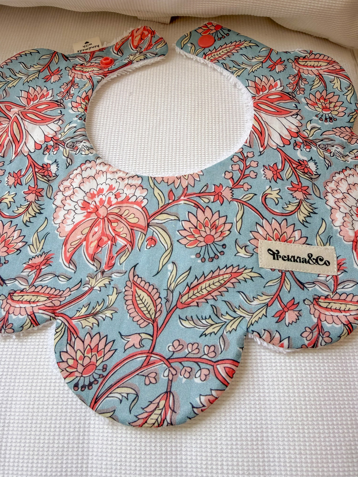 Babero Oriental Naranja y Turquesa