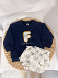 Conjunto sudadera azul marino y cubrepañal